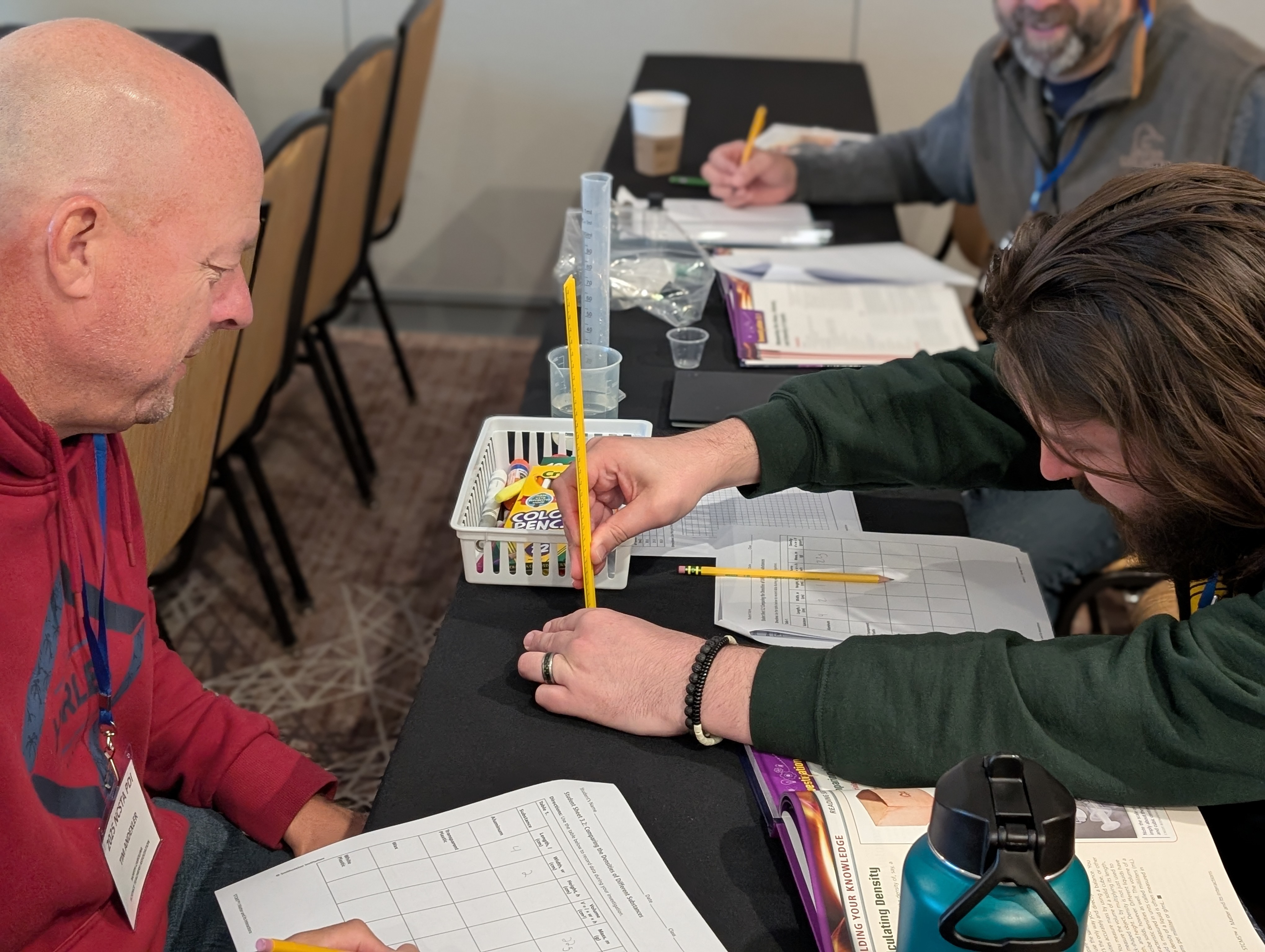 A person reading a book on the couch